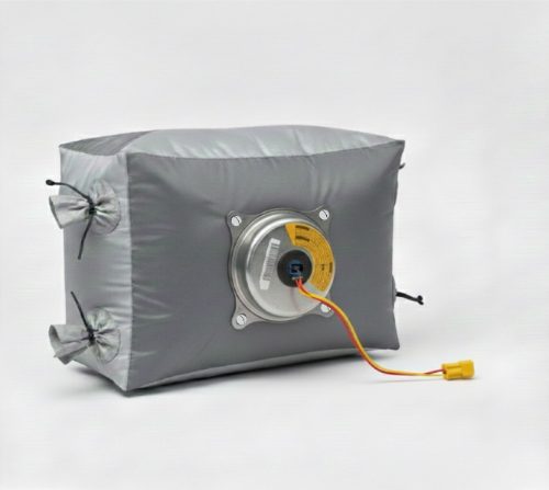 Grey airbag with a mounted pyrotechnic gas generator and ignition cable