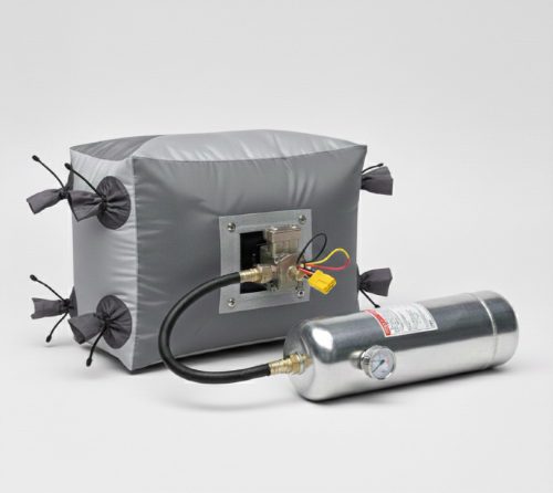 Grey airbag with a valve block connected by a hose to a compressed-air cylinder